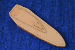 "Thuban" Vertical PSD knife sheath, back side view. This undyed, untreated leather shoulder is for standard vertical wear along a belt or webbing