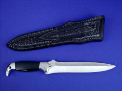"Treatymaker LT" reverse side view. Knife is clean and slick; sheath back and belt loop are completely finished.