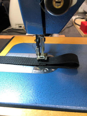 Sewing elastic loop on nylon web