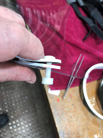 Mounting first pivot screw