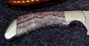 Lace Amethyst gemstone knife handle; amethyst is hard and durable, and polishes brighty