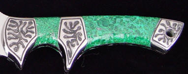Chrysocolla gemstone on collector's tactical knife