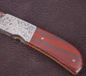 Banded Jasper with Hematite on liner lock folding knife 