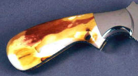 Mookaite Jasper is tough enough to be used on a full tang knife without rear bolster support
