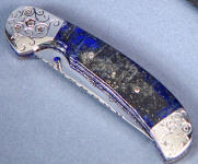 Lapis Lazulii from Peru, with gray calcite and interesting patterns on a linerlock folding knife handle