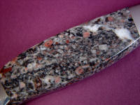 The Crinoid fossils are abundant and complex, beautiful in this gemstone which is smooth an tough, with a bright polish