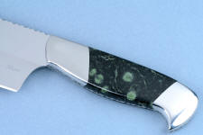 Nebula stone is hard, glassy, tough, and durable, outlasting the blade on this chef's knife