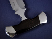 Black Petrified Palm wood cut "cross grain" has distinctive dotted pattern on this dagger handle