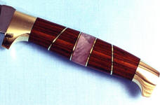 Rose quartz on a hidden tang knife handle with cocobolo hardwood and brass