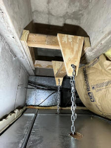 Monitor hanger in concrete joists