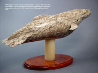 "Pacifica" the stand and base were carved first, then the knife was fitted to the whale's body.