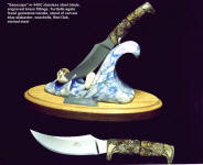 "Seascape" stand is hand-carved blue alabaster, seashells, red oak. Knife handle is fossilized Turitella agate gemstone