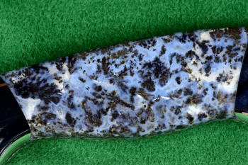 "Zosma" obverse side view in T3 deep cryogenically treated 440C high chromium martensitic stainless steel blade, 304 stainless steel bolsters, Texas Moss Agate gemstone handle, sheath in leather shoulder inlaid with frog skin, nylon stitching
