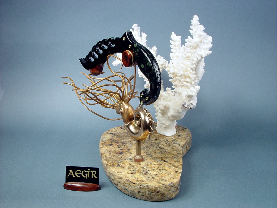 "Aegir" knife sculpture on custom handmade sculpted display stand