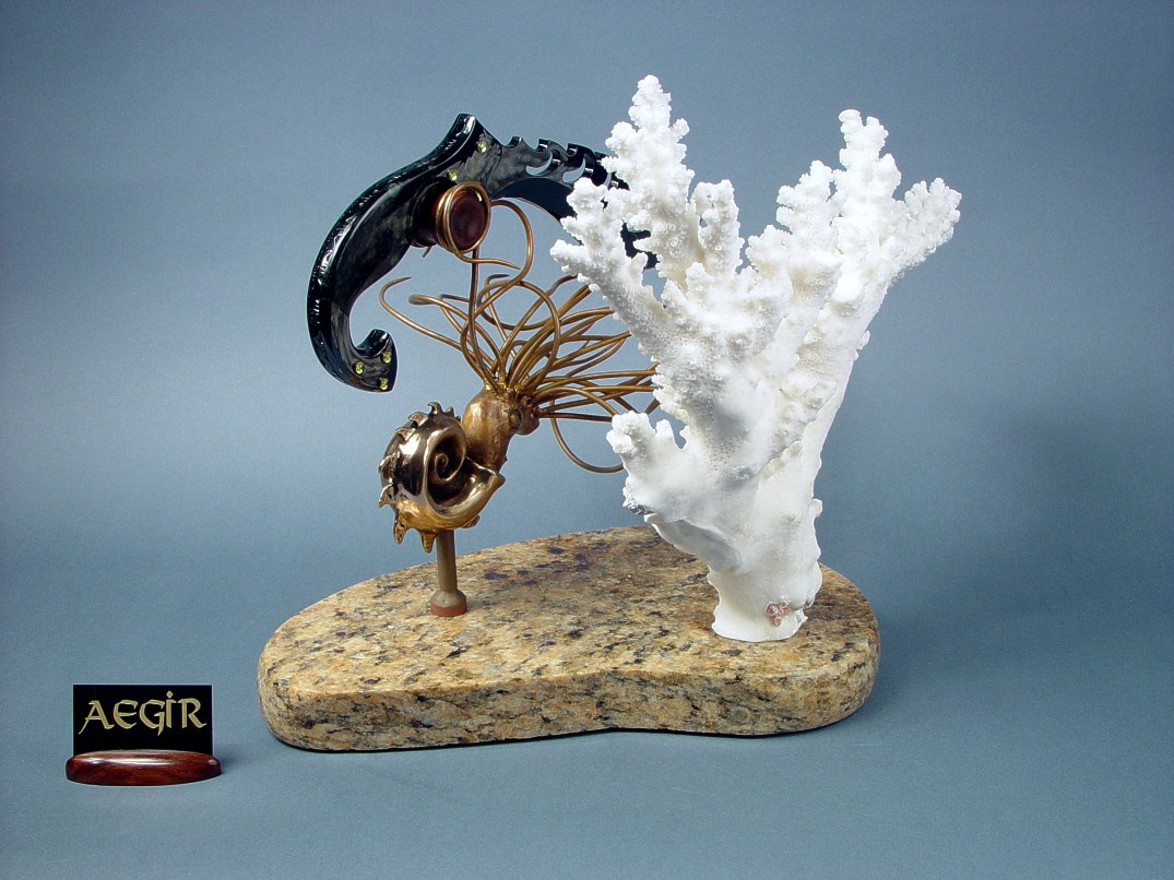 "Aegir" knife sculpture, rear right view. Bronze nautilus uplifts knife to the sea