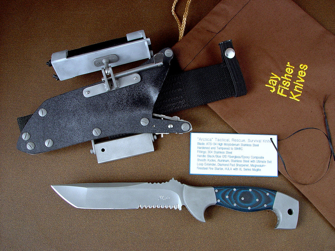"Arctica" obverse side view of counterterrorism, combat, professional service knife  in ATS-34 high molybdenum stainless steel blade, 304 stainless steel bolsters, blue/black G10 fiberglass/epoxy composite handle, locking kydex, aluminum, stainless steel sheath with ultimate belt loop extender, firestarter, sharpener, and HULA advanced flashlight holder