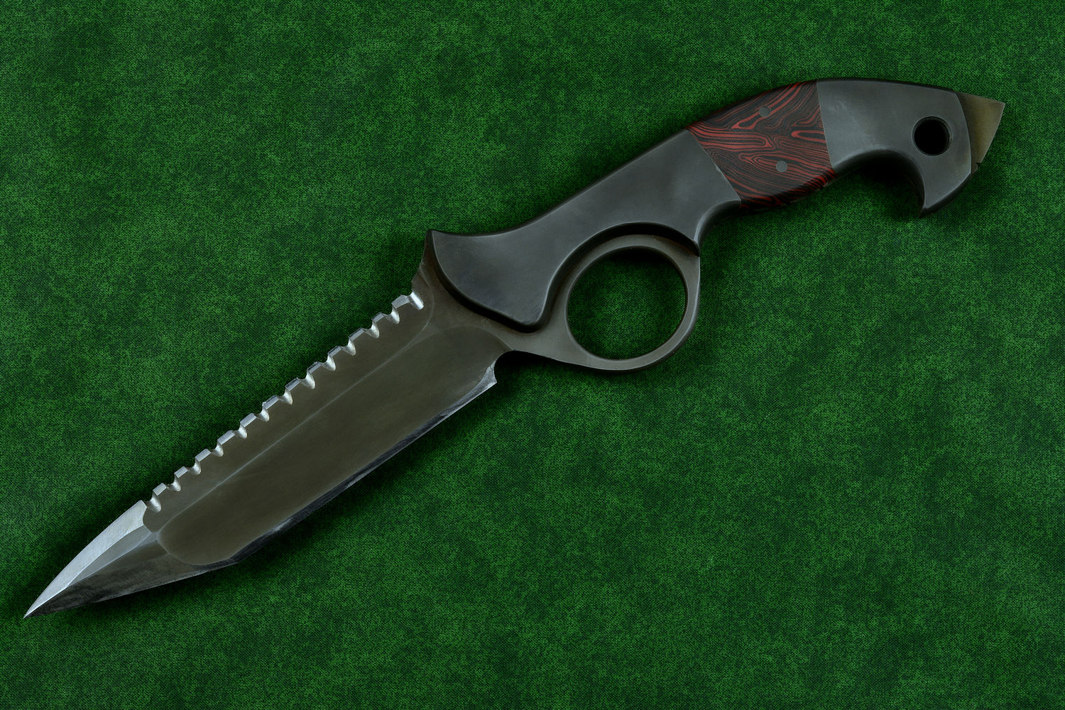 "Ari B'Lilah" counterterrorism, tactical, combat knife, obverse side view in T4 cryogenically treated 440C high chromium martensitic stainless steel blade, 304 stainless steel bolsters, red/black  G10 handle, hybrid tension tab locking sheath in kydex, anodized aluminum, anodized titanium, black oxide stainless steel