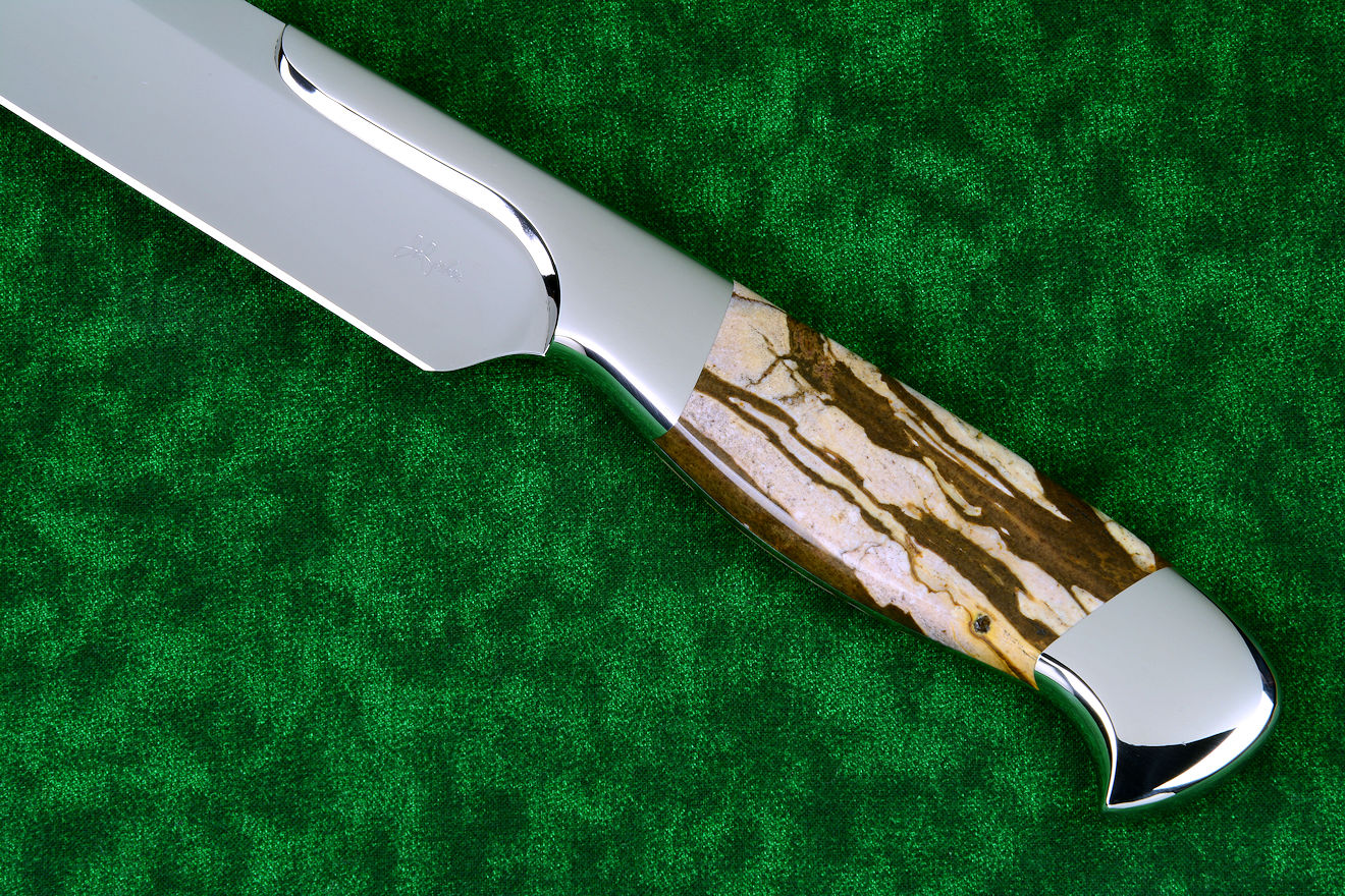 "Bordeaux" fine professional grade knife, obverse side bolster and handle detail in 440C high chromium stainless steel blade treated with T3 cryogenic heat treatment, 304 stainless steel bolsters, Brown Zebra Jasper gemstone handle