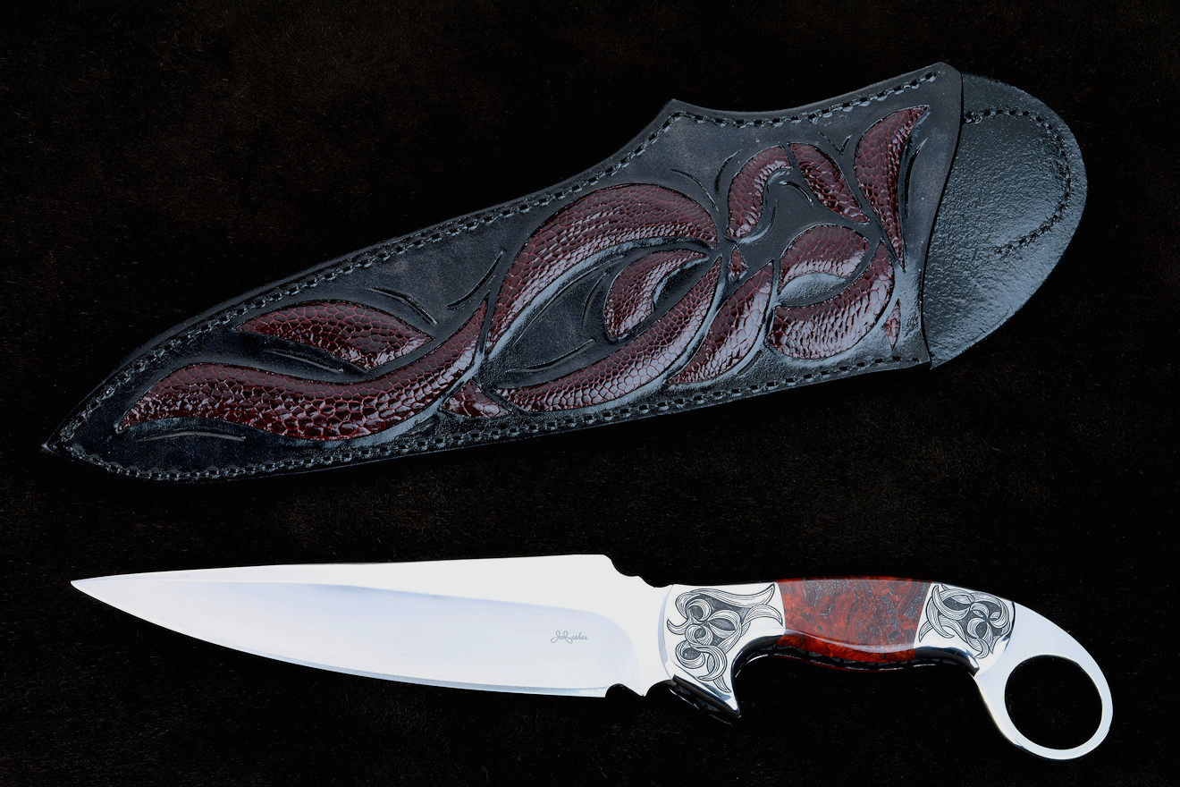 "Bulldog" obverse side view in 440C high chromium stainless steel blade, hand-engraved 304 stainless steel bolsters, Fossilized Stromatolite Algae gemstone handle, hand-carved leather sheath inlaid with burgundy ostrich leg skin