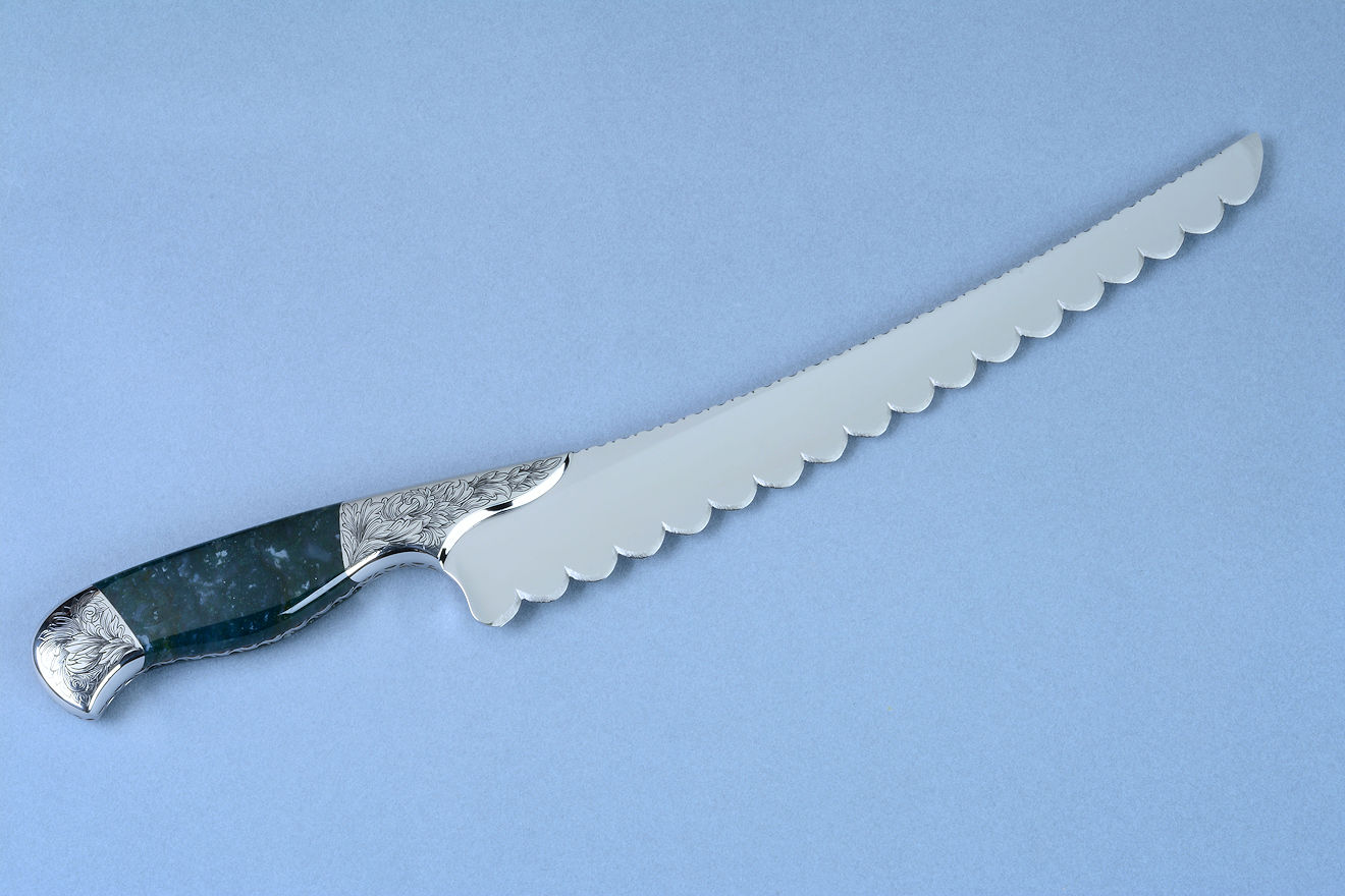 "Caph" (Cassiopeia chef's set) Bread, Serrated knife, reverse side view  in T3 cryogenically treated 440C high chromium stainless steel blade, hand-engraved 304 stainless steel bolsters, Indian Green Moss Agate gemstone handle