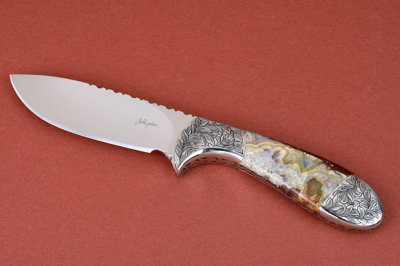 "Chicoma" obverse side view in 440C high chromium stainless steel blade, hand-engraved 304 stainless steel bolsters, Carnival Crazy Lace Agate gemstone  handle, hand-carved, hand-dyed leather sheath