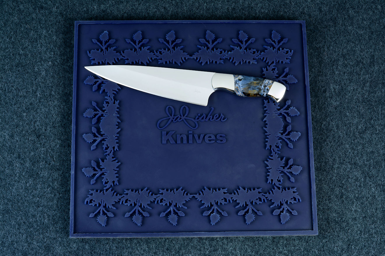 "Corvus" chef's knife and cutting board prise in high strength silicone rubber