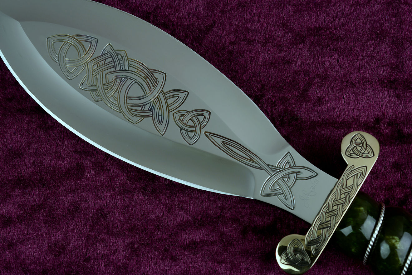 "Darach" (Celtic Oak), obverse side view in hand-engraved 440C high chromium stainless steel blade, hand-cast, hand-engraved bronze guard and pommel, nephrite jade gemstone  handle wrapped with sterling silver, hand-carved, hand-dyed leather sheath