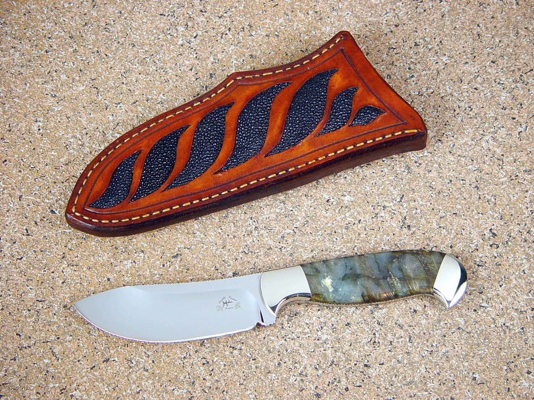 "Fornax" nessmuk style blade in 440C stainless steel blade, nickel silver bolsters, Labradorite gemstone handle, black stingray skin inlaid in leather sheath