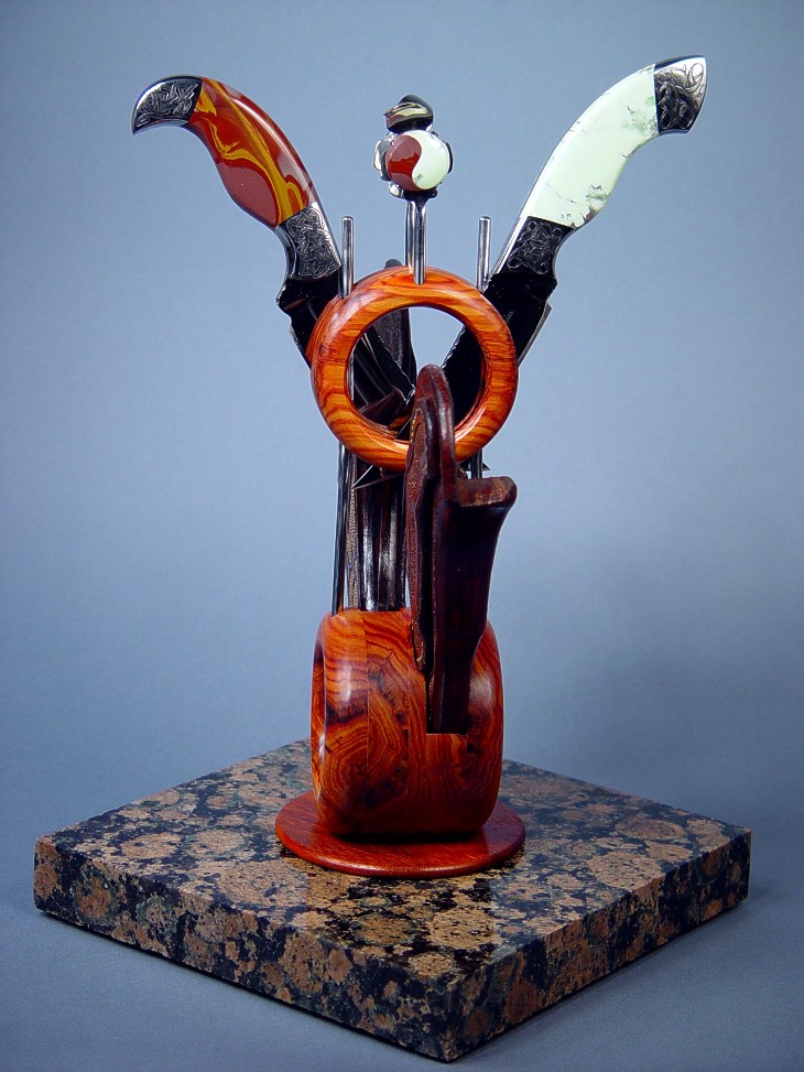 Custom Knife display stand for Izanami, Izanagi knives and sheaths. Stand is granite, tulipwood, 304 stainless steel, Noreena Jasper and Nickel Magnesite gemstone, and Paduk hardwood