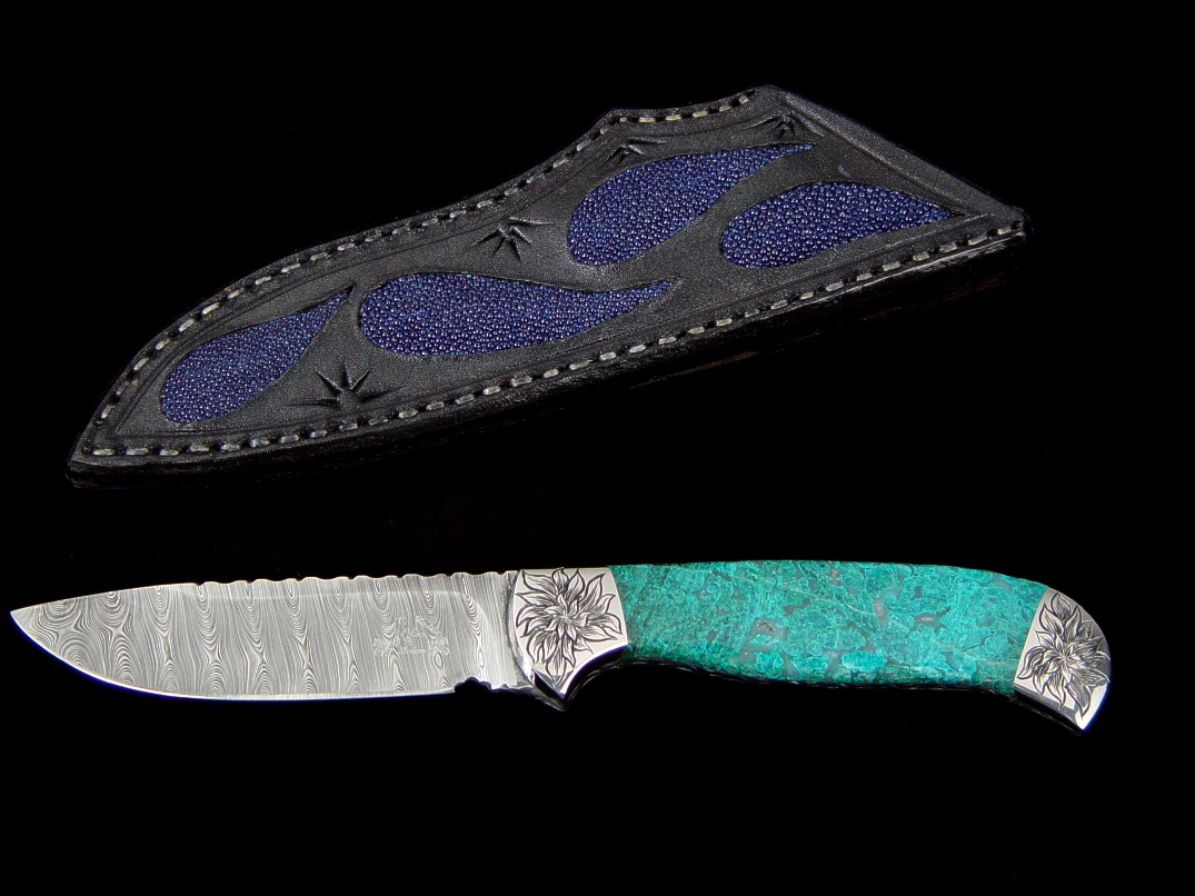 "Izar" obverse side view in stainless steel damascus blade, hand-engraved 304 stainless steel bolsters, Chrysocolla gemstone handle, blue stingray skin inlaid in hand-carved leather sheath