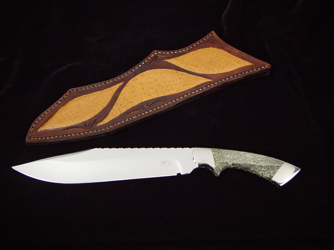 "Jungle Bowie" custom knife, obverse side view in 440C high chromium stainless steel blade, 304 stainless steel bolsters, Nephrite Jade gemstone handle, emu skin inlaid in hand-carved leather sheath
