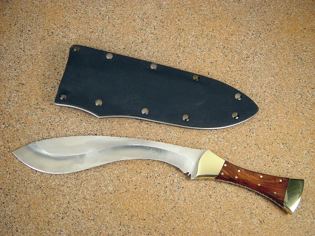 "Nasmyth-Marius" khukri, obverse side view in satin finished 440C high chromium stainless steel blade, brass bolsters, Honduras Rosewood hardwood handle, kydex, aluminum, steel sheath