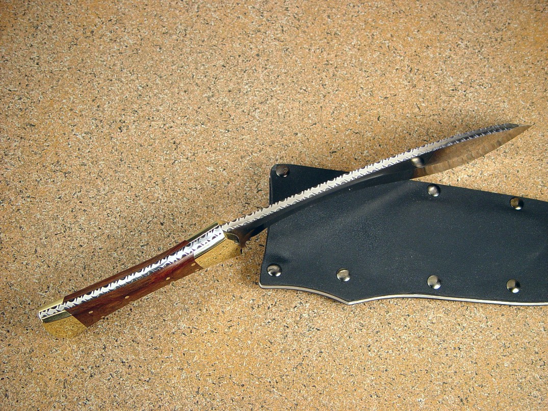 "Nasmyth-Marius" khukri, obverse side view in satin finished 440C high chromium stainless steel blade, brass bolsters, Honduras Rosewood hardwood handle, kydex, aluminum, steel sheath