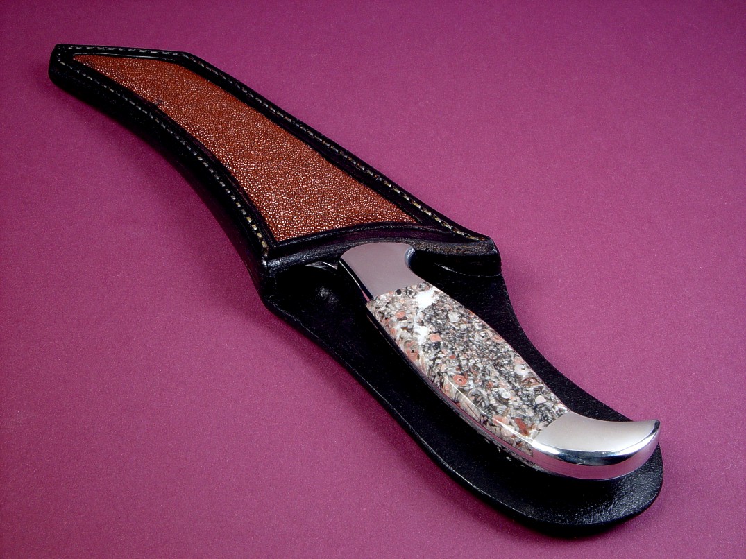 "Nereid" obverse side view in 440C high chromium stainless steel blade, 304 stainless steel bolsters, Fossilized Crinoid Marble gemstone handle, brown Stingray skin inlaid in hand-carved leather sheath