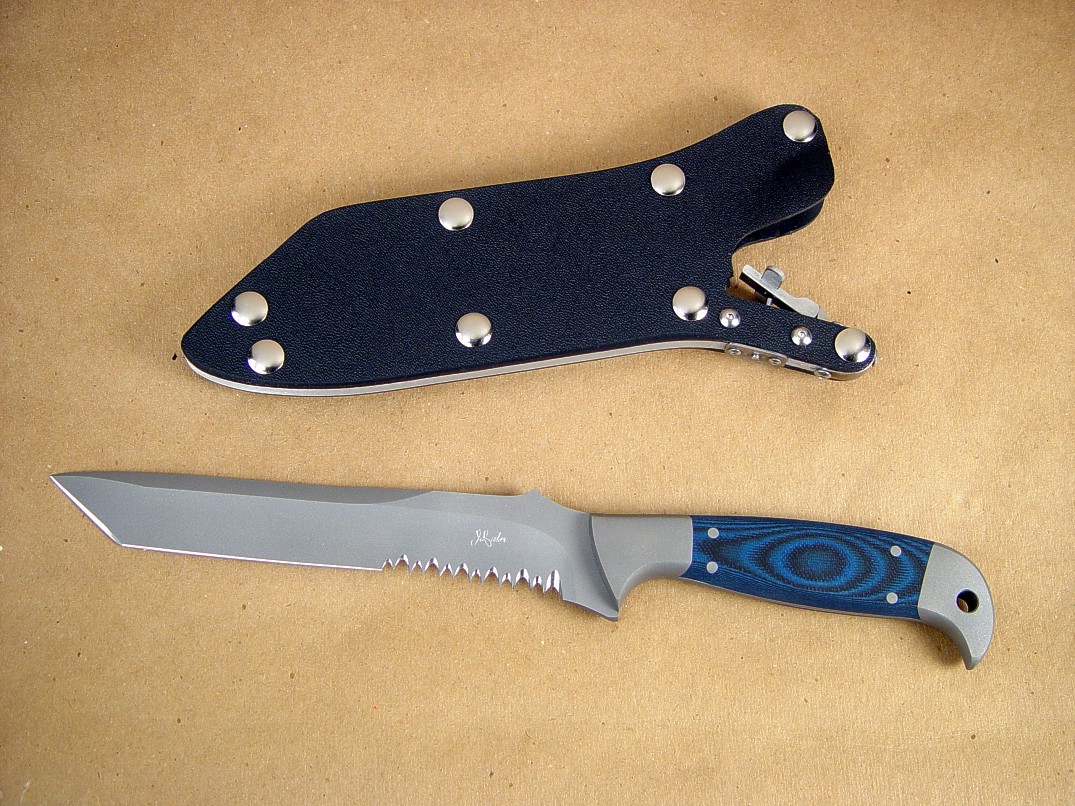 "PJLT" Tactical Combat, Search and Rescue knife, obverse side view;  in 440C high chromium stainless steel blade, 304 stainless steel bolsters, Blue/Black G10 fiberglass/epoxy laminate handle, locking kydex, aluminum, stainless steel sheath