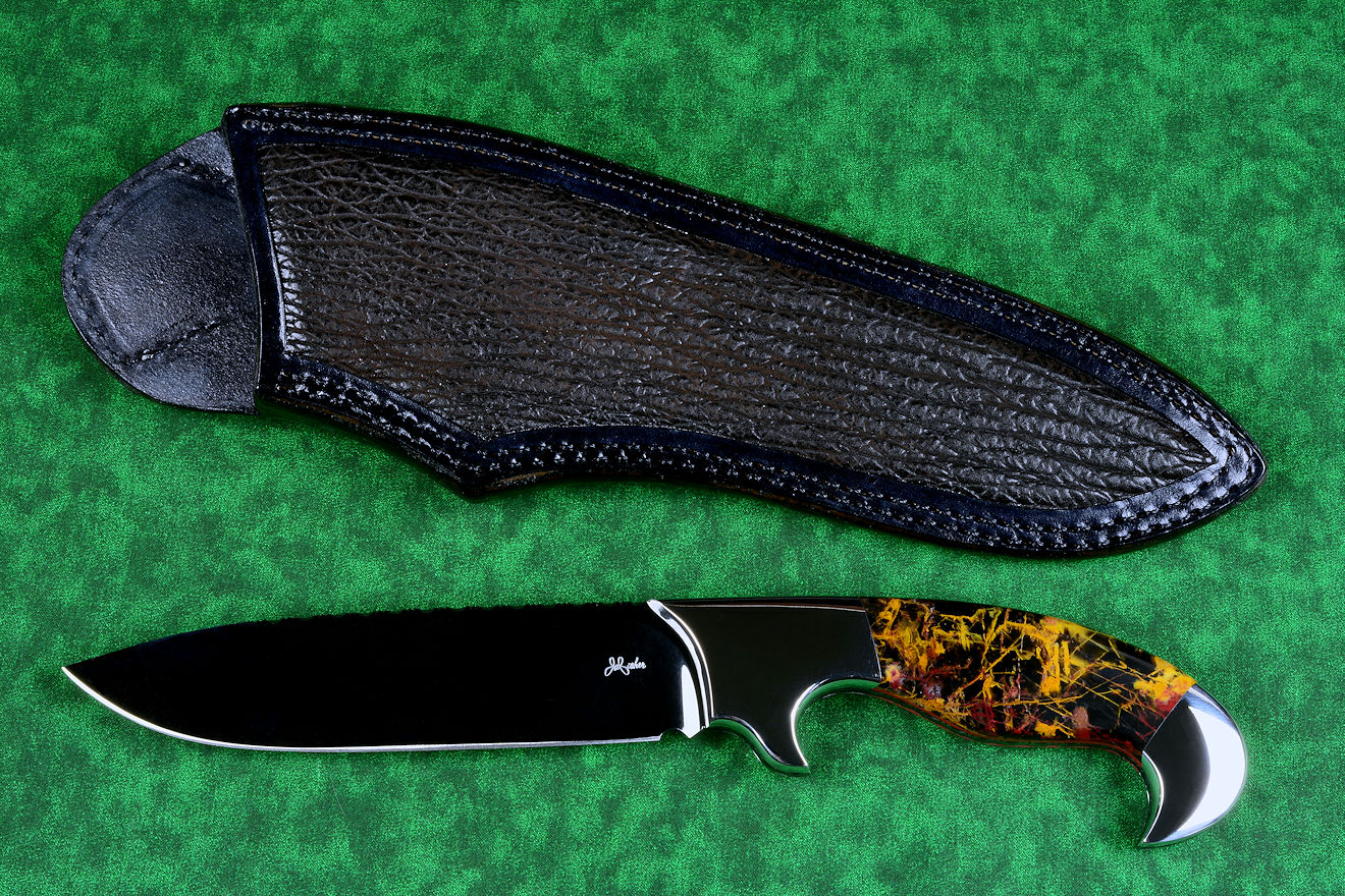 "Quetzal", obverse side view, in deep cryogencially treated, hot blued O1 high carbon tungsten-vanadium tool steel blade, 304 stainless steel bolsters, Pilbara Picasso Jasper and Red River Jasper gemstone handle, hand-carved leather sheath inlaid with shark skin