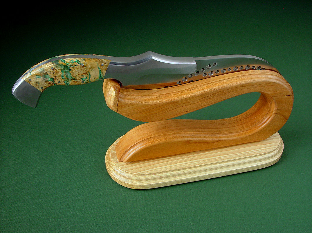 "Saussure" chef's knife in satin finished 440C high chromium stainless steel blade, 304 stainless steel bolsters, stabilized Box Elder Burl hardwood handle, stand of Cherry and Pecan hardwoods
