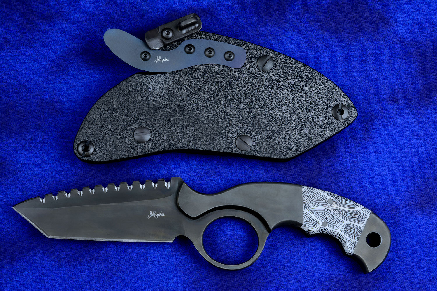 "Skeg"  tactical, counterterrorism, crossover knife, sheathed view in T4 Cryogenically treated ATS-34 high molybdenum martensitic stainless steel blade, 304 stainless steel bolsters, white and black tortoiseshell pattern G10 fiberglass/epoxy composite handle, hybrid tension tab-locking sheath in kydex, anodized aluminum, black oxide stainless steel and anodized titanium