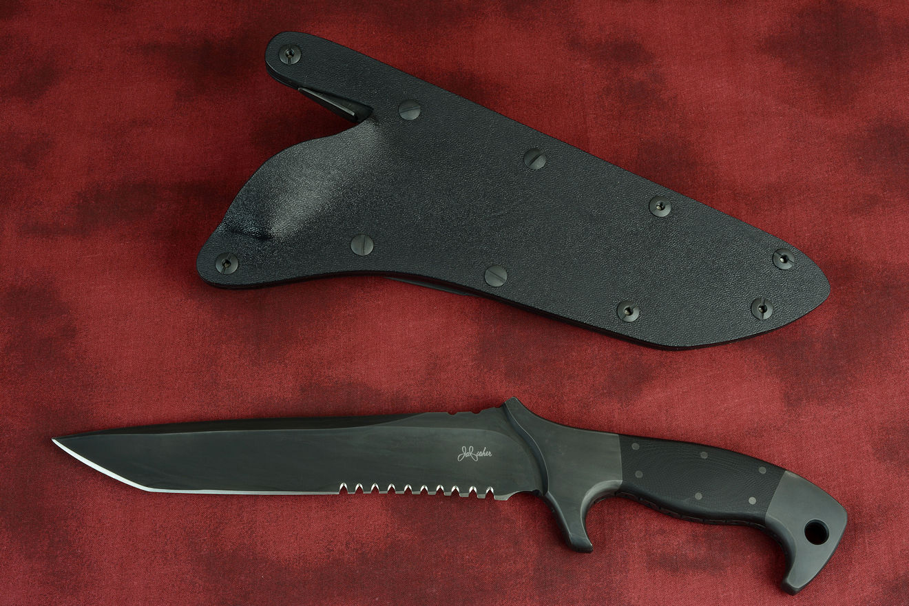 "Taranis" Tactical Counterterrorism Knife in Shadow black treatment of CPMS30V high vanadium stainless steel blade, 304 stainless steel bolsters, G10 fiberglass/epoxy composite handle, hand-carved leather sheath inlaid with buffalo (bison) skin