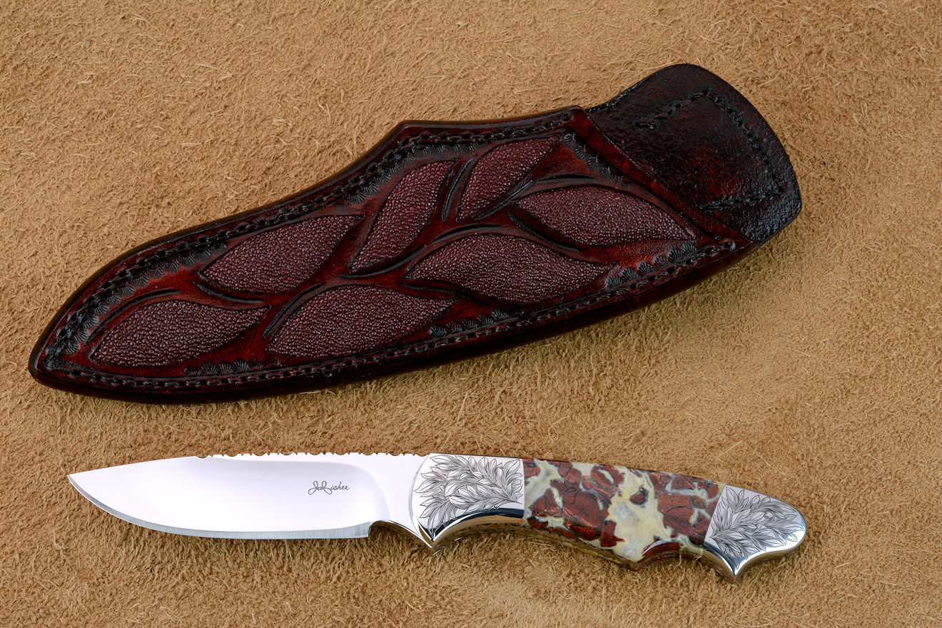 "Thuban" obverse side view in CPM154CM powder metal technology high molybdenum stainless steel blade, hand-engraved 304 stainless steel bolsters, Brecciated Jasper gemstone handle, hand-carved leather sheath inlaid with rayskin