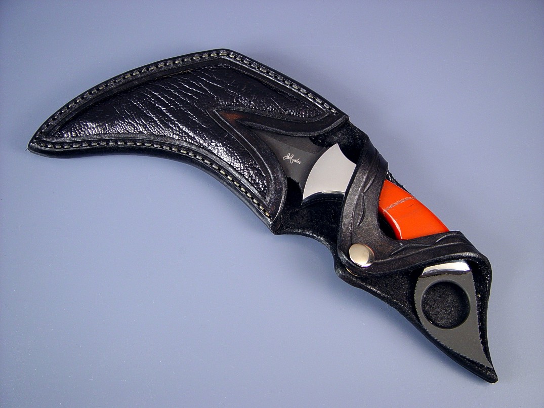 "Triton" kerambit, obverse side view: O-1 high carbon tool steel blade, carbon steel bolsters, Red River Jasper gemstone handle, ostrich leg skin inlaid in hand-carved leather sheath