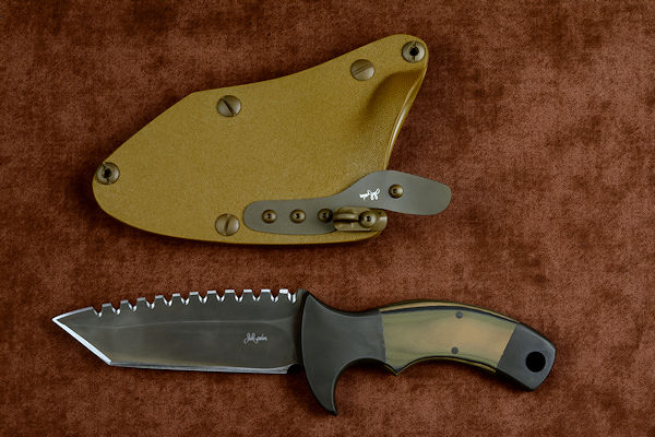 "Krag" tactical, counterterrorism, crossver knife, obverse side view in ATS-34 high molybdenum martensitic stainless steel blade, 304 stainless steel bolsters, coyote, black, olive G10 fiberglass/epoxy composite handle, hybrid tension tab-locking sheath in kydex, anodized aluminum, gold oxide stainless steel and anodized titanium