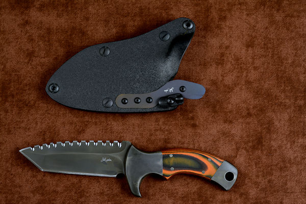 "Krag"tactical, counterterrorism, crossver knife, obverse side view in T4 cryogenically treated 440C high chromium martensitic stainless steel blade, 304 stainless steel bolsters, Orang and Black  G10 fiberglass/epoxy composite handle, hybrid tension tab-locking sheath in kydex, anodized aluminum, black oxide stainless steel and anodized titanium