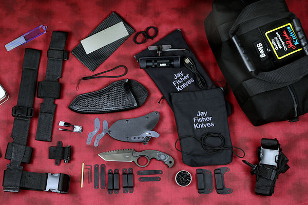 "Skeg" tactical knife kit, complete, with UBLX, EXBLX, HULA, LIMA, diamond sharpener, leather sheath, sternum harness, lanyards, staps, clamps, hardware, and heavy ballistic nylon duffle