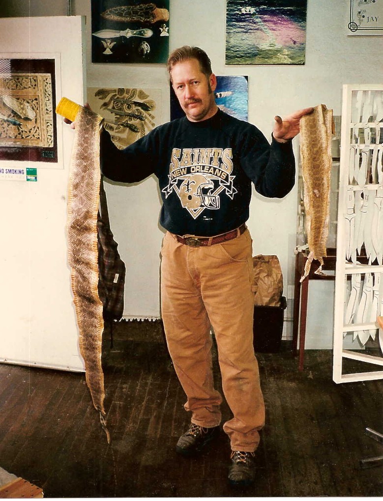 Jay Fisher with Western Diamondback, Prairie Rattlesnake skins for knife sheath inlays