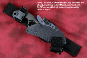 LIMA accessory with Olite flashlight on hybrid tension tab lock tactical sheath with UBLX