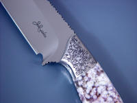 Hand-engraved 304 austenitic high chromium stainless steel bolsters on fine collector's knife
