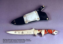Etching in stainless steel is dark and highly detailed in this Special Forces commemorative knife