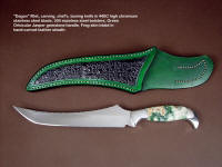 "Dagon" fillet, boning, carving, chef's, collector's knife, obverse side view in 440C high chromium stainless steel blade, 304 stainless steel bolsters, Green Orbicular Jasper gemstone handle, frog skin inlaid in hand-carved leather sheath