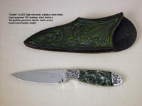 "Deneb" obverse side view in 440C high chromium stainless steel blade, hand-engraved 304 stainless steel bolsters, Seraphinite gemstone handle, hand-carved, hand-tooled leather sheath